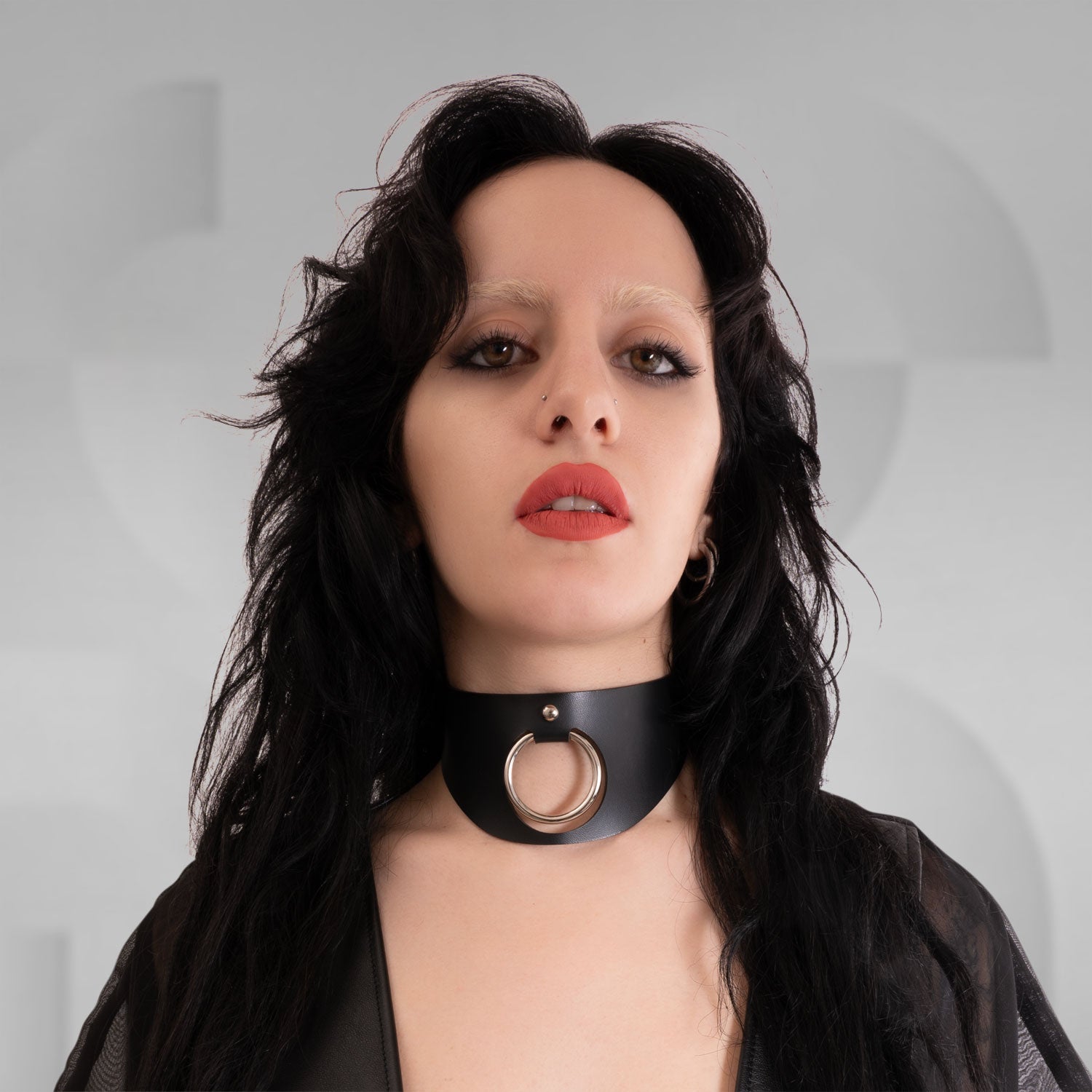 Stunning black faux leather choker with modern design.