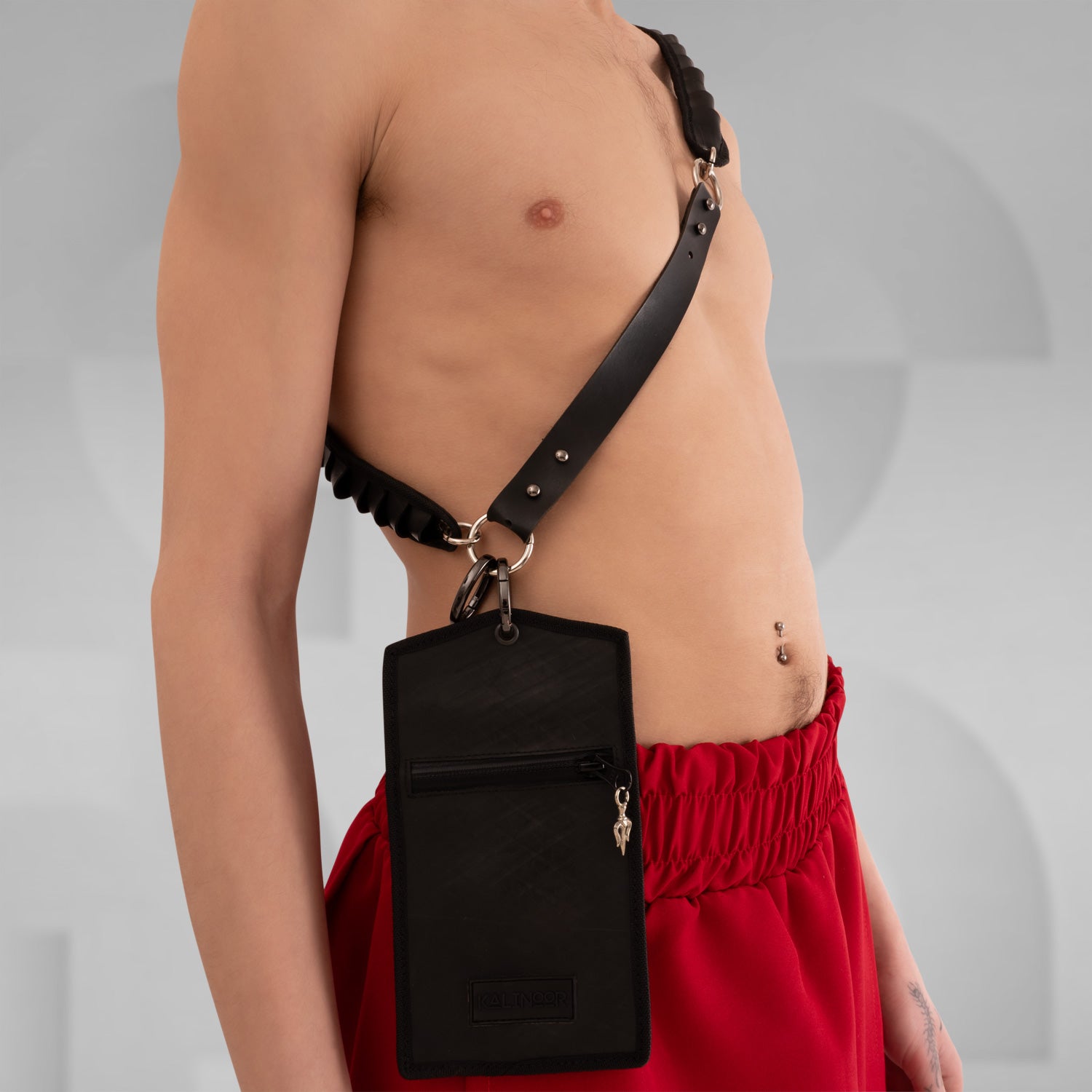 Faux Leather Phone Pocket by Kalinoor – crafted from cruelty-free faux leather with a secure inside pocket for small essentials.