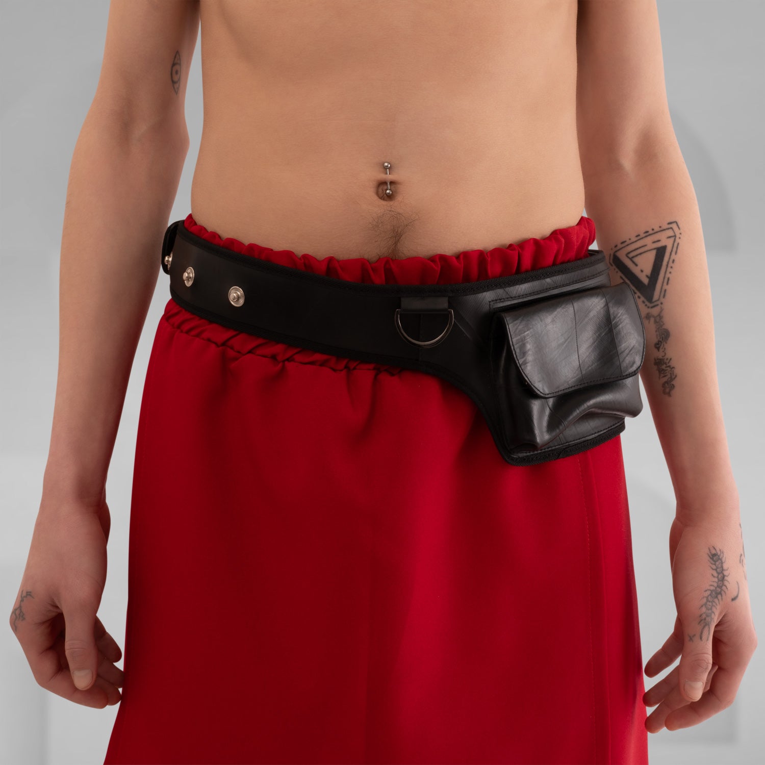 Waterproof Vegan Belt Bag by Kalinoor - crafted from 100% recycled rubber, with waterproof zippers, anti-spy lining, and multiple pockets for secure storage.