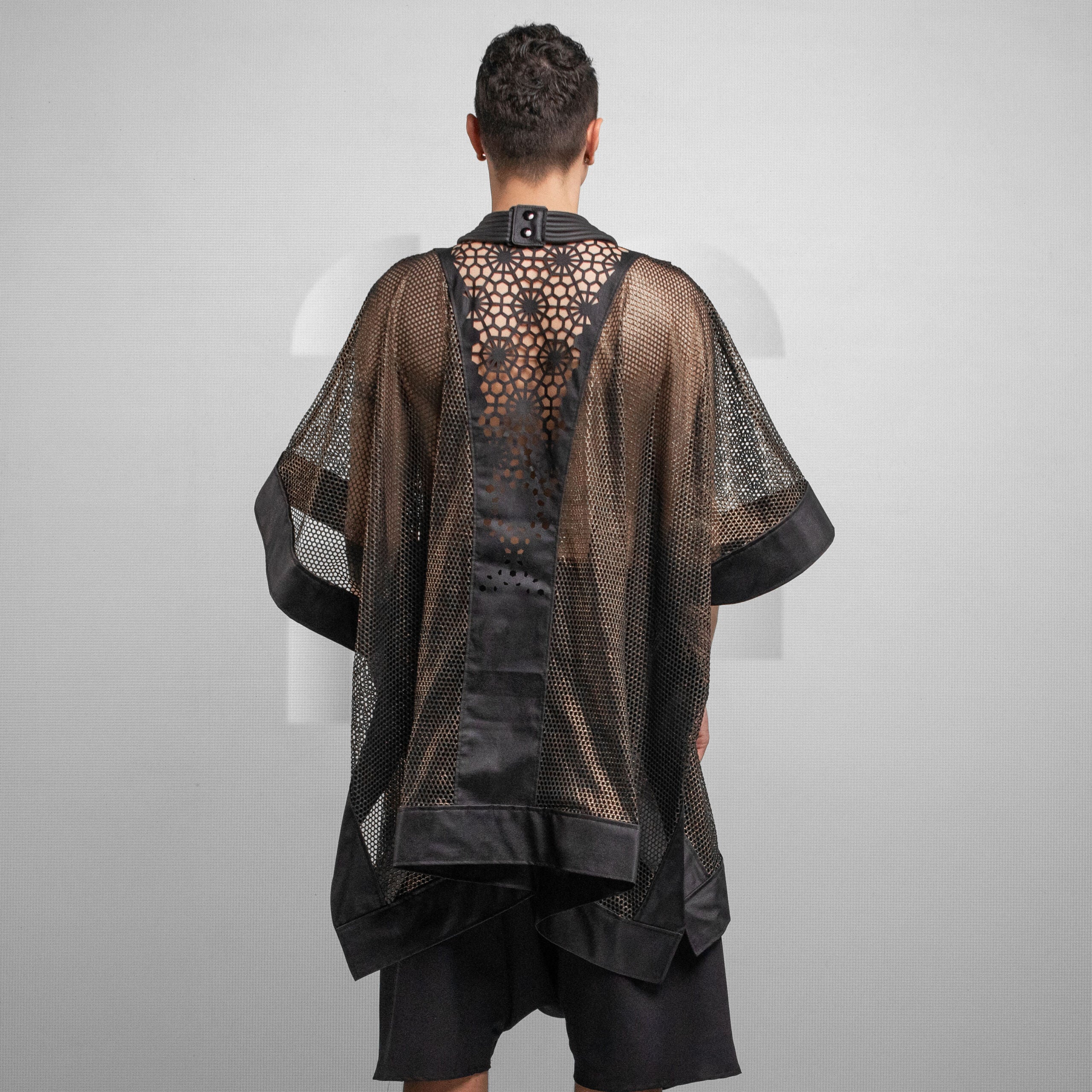 Flowing, ethereal mesh statement kimono.