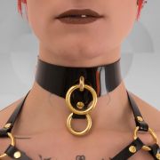 The choker is designed to be bold and eye-catching, making a statement that goes against mainstream fashion norms.