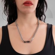 A glamorous Berlin chain necklace made of stainless steel, with a shiny plate centerpiece, radiating elegance and charm.