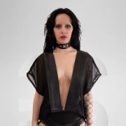 Transparent short kimono with vegan leather laser cut design at the back, highlighting the edgy fashion scene of Berlin's clubs.