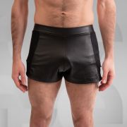 Sexy black leather shorts with alluring mesh details, perfect for Berlin's club scene.