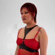 Vegan leather harness sculpting the body in avantgarde clubwear style