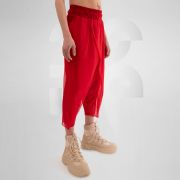 Red avantgarde trousers perfect for clubnights, festivals, or everyday wear