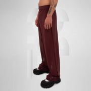 Gender-neutral red mesh pants with a relaxed fit, designed for the Berlin club scene and modern clubwear fashion.