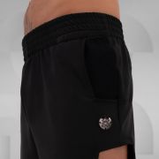 Black sporty shorts with side cut-outs and pockets, perfect for Berlin nightlife.